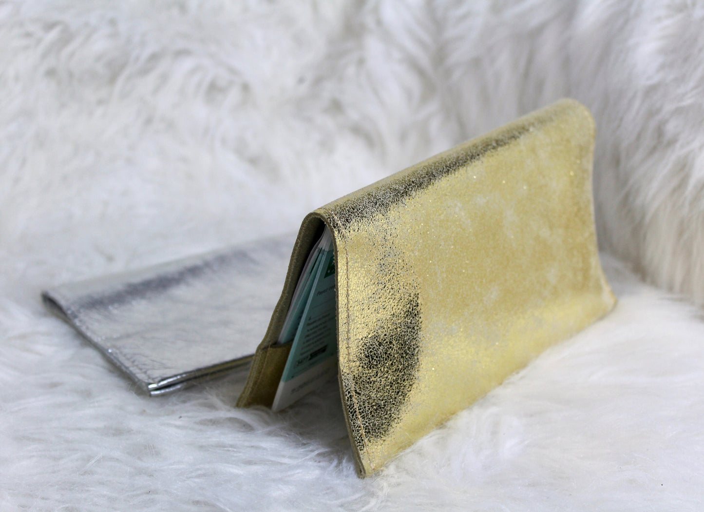 Checkbook holder in gold, silver, champagne leather
