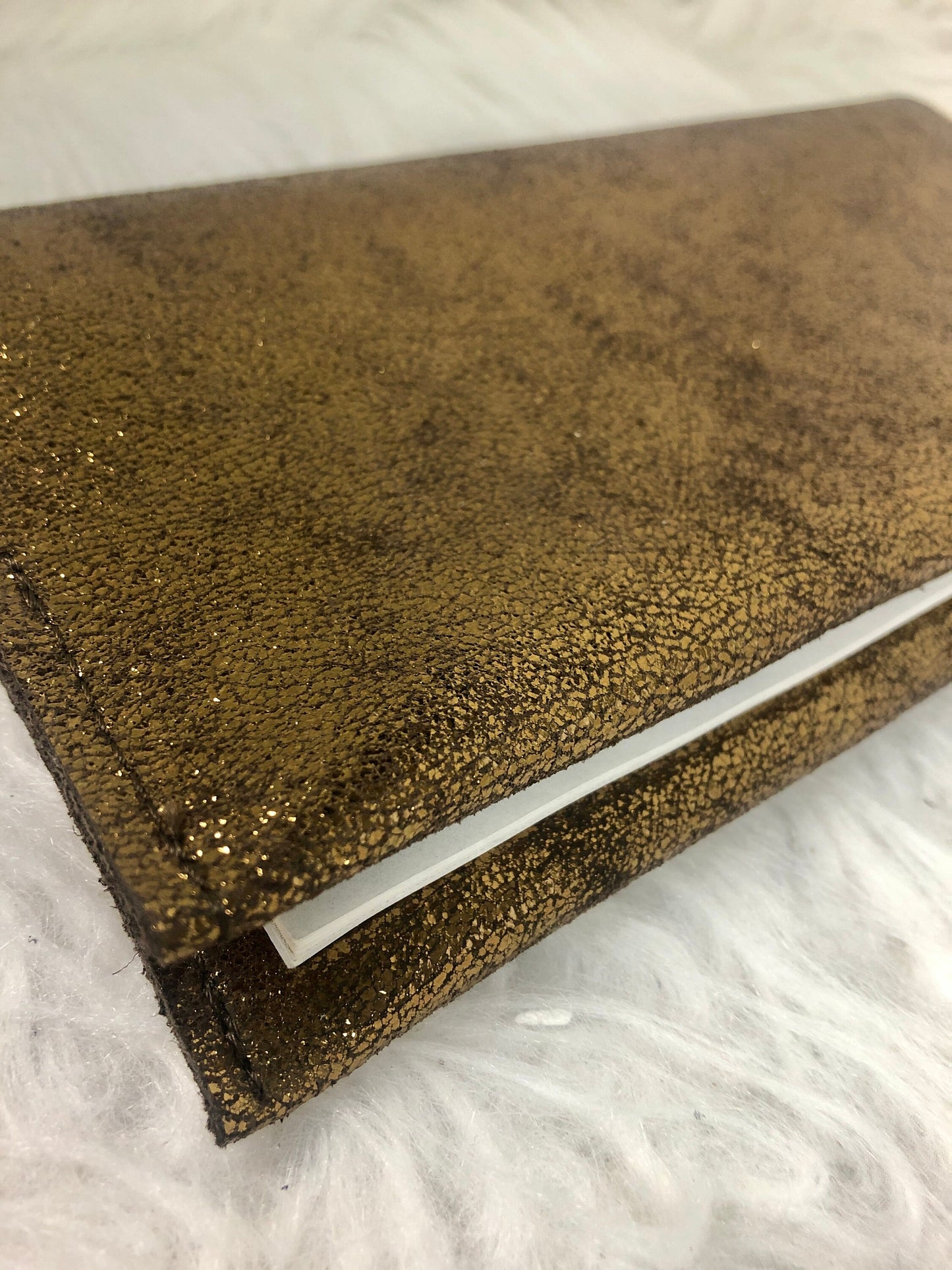 Checkbook holder in gold, silver, champagne leather