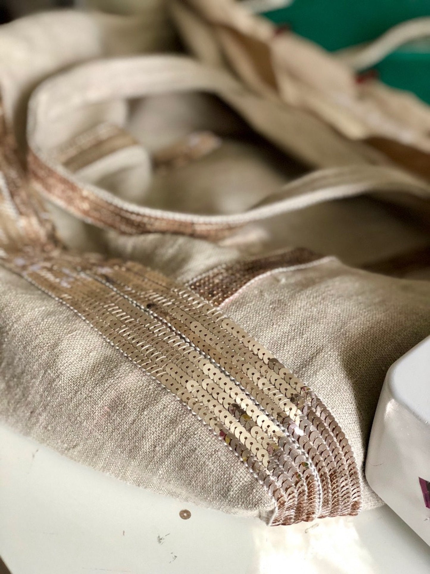 Washed linen tote bag with gold sequins