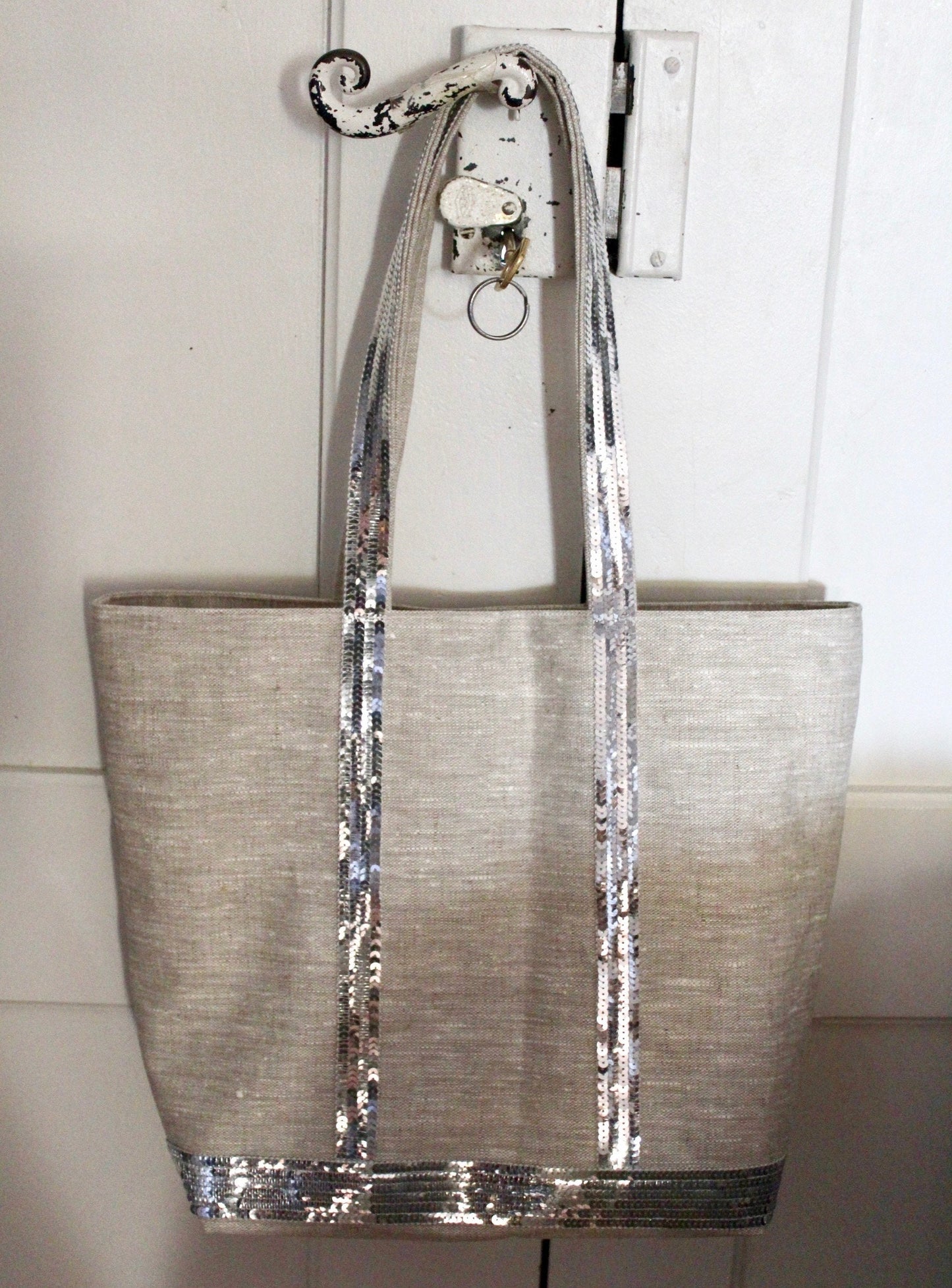 Tote bag in natural coated linen with silver sequins