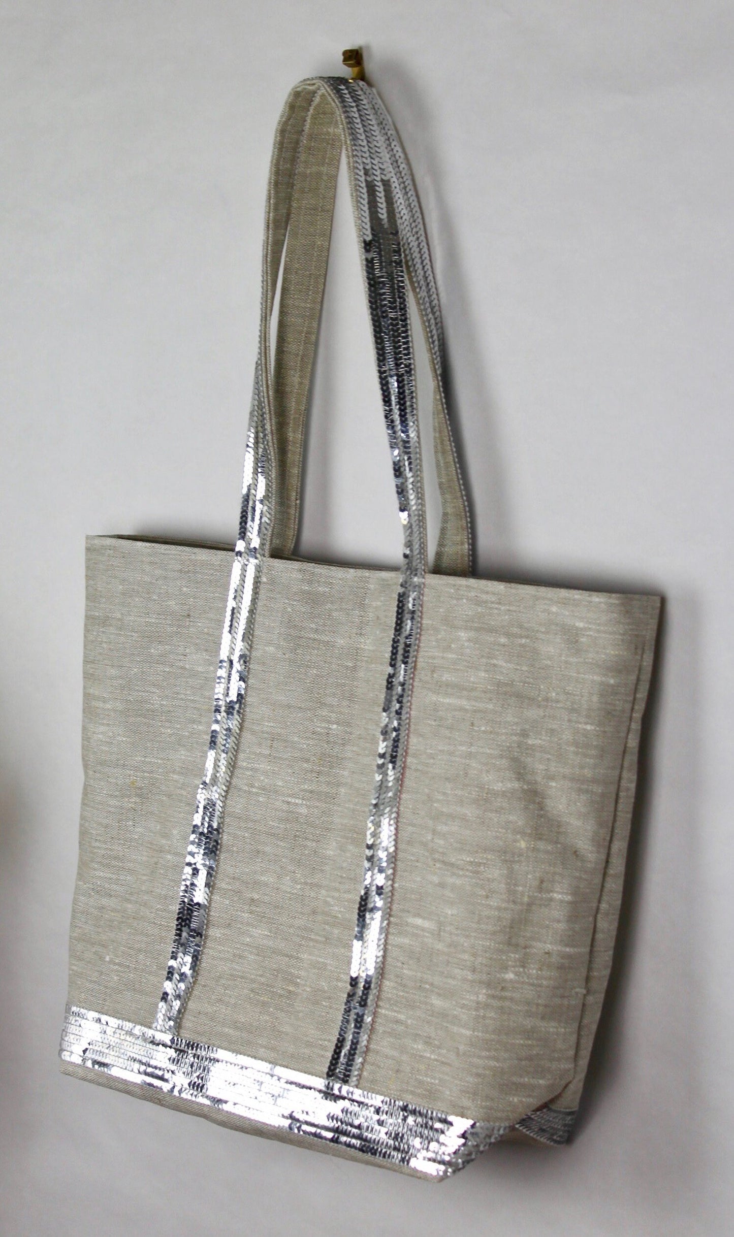 Tote bag in natural coated linen with silver sequins