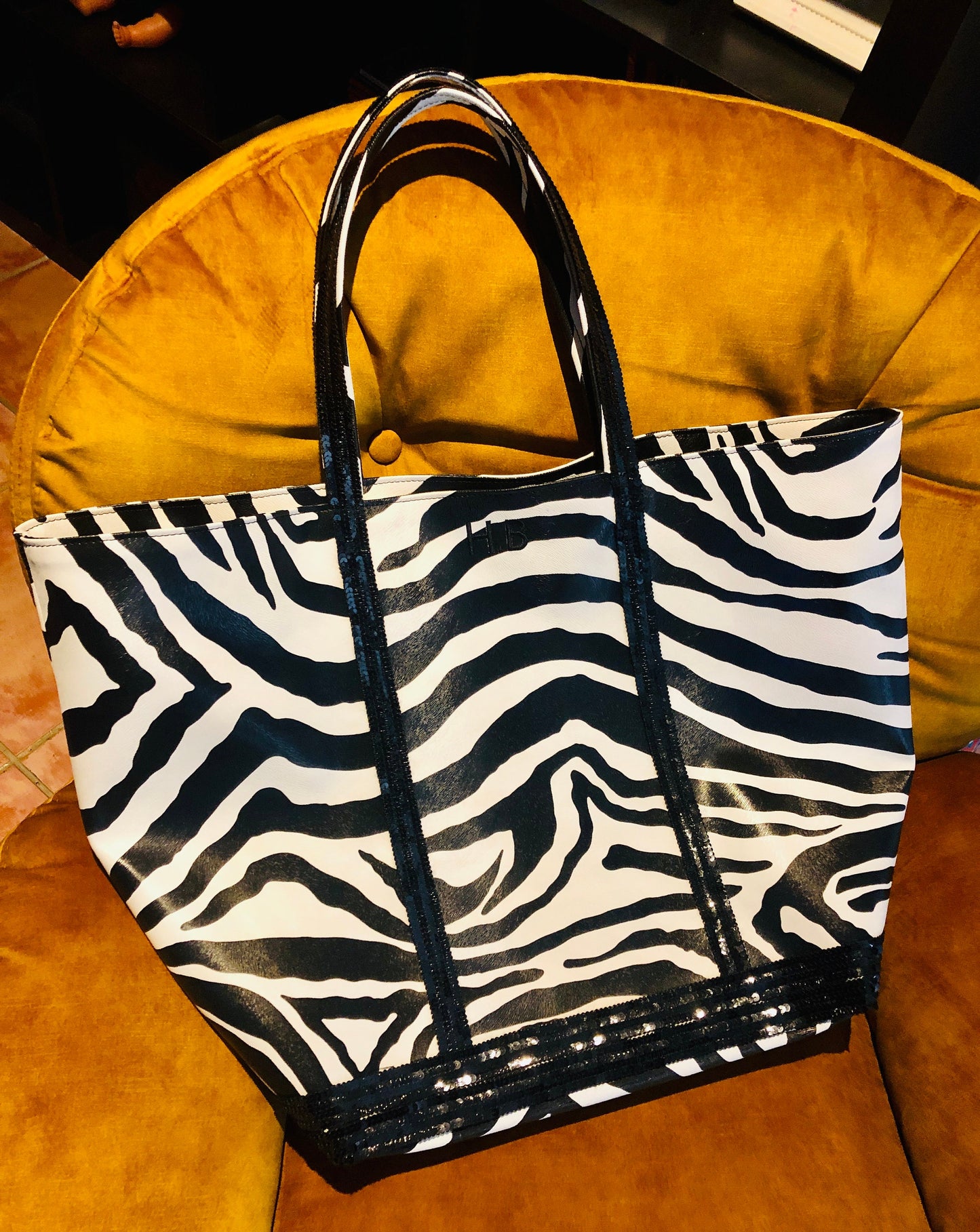 Faux leather zebra tote bag with black sequins