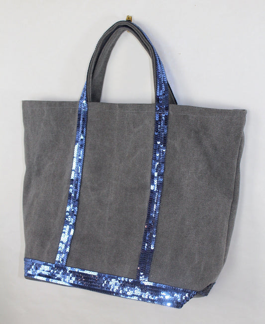 Cotton canvas tote bag topped with blue sequins.