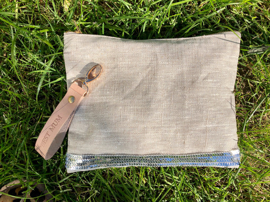 Natural coated linen clutch with silver glitter