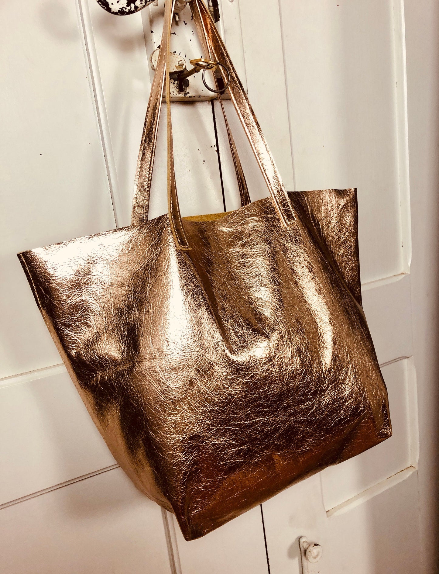 Pink gold leather tote bag